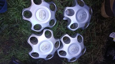 Toyota tundra pick up/suv center caps with lug nuts