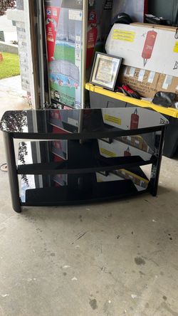 Entertainment center dark glass H 21. w16 L 44 1/2