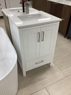 24” solid wood white vanity, Quartz stone top, available for pick up