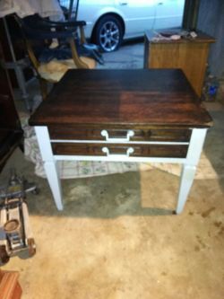 A dresser and end table