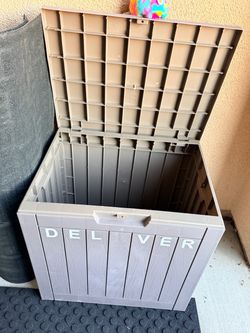 Brown delivery storage box with lid.