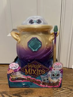 Magic Mixies Magical Misting Cauldron with Interactive 8 inch Blue Plush Toy