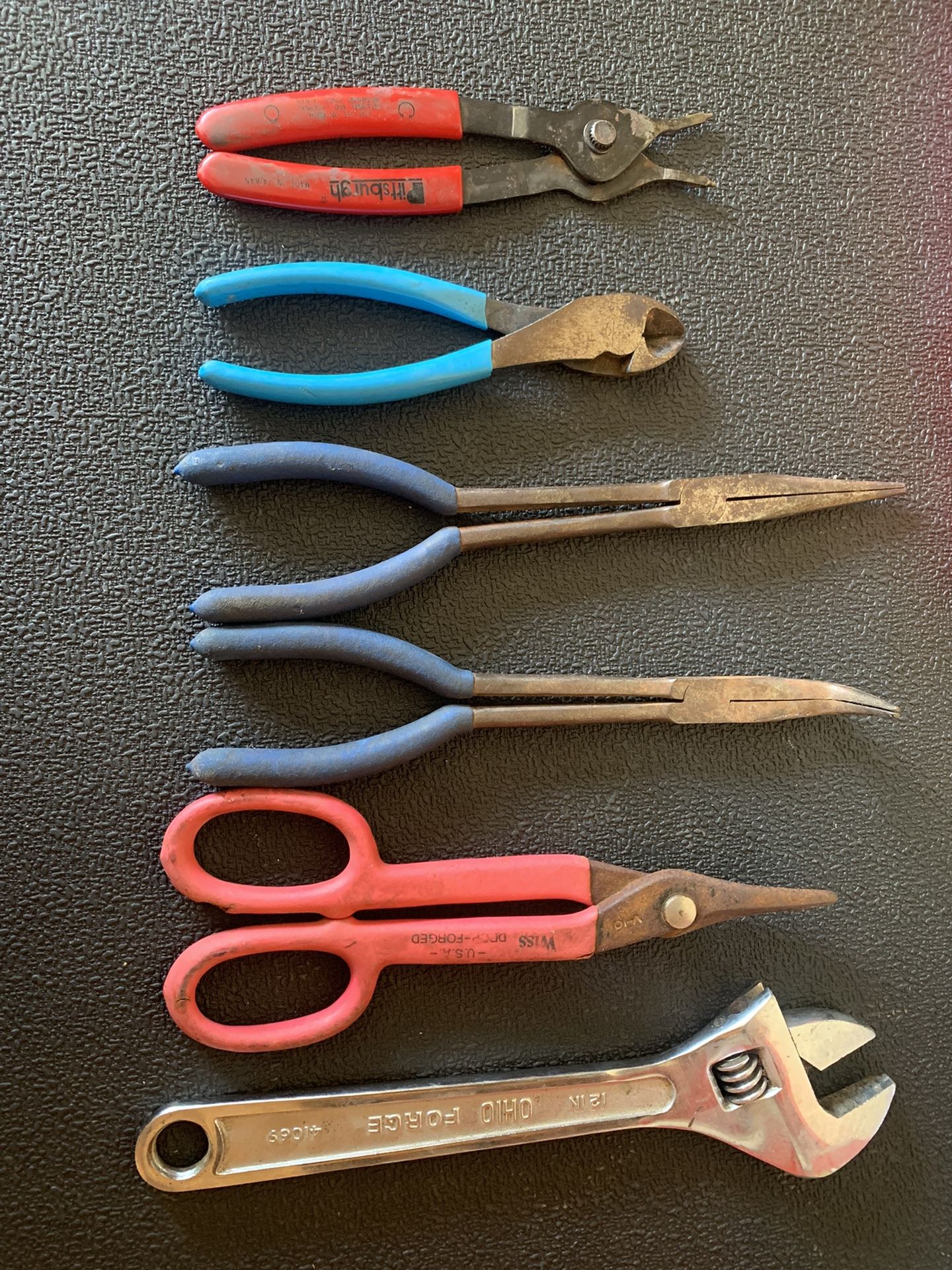 Assortment Of Pliers And Wrench