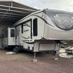 2014 Heartland 35Res Silverado Fifth wheel.