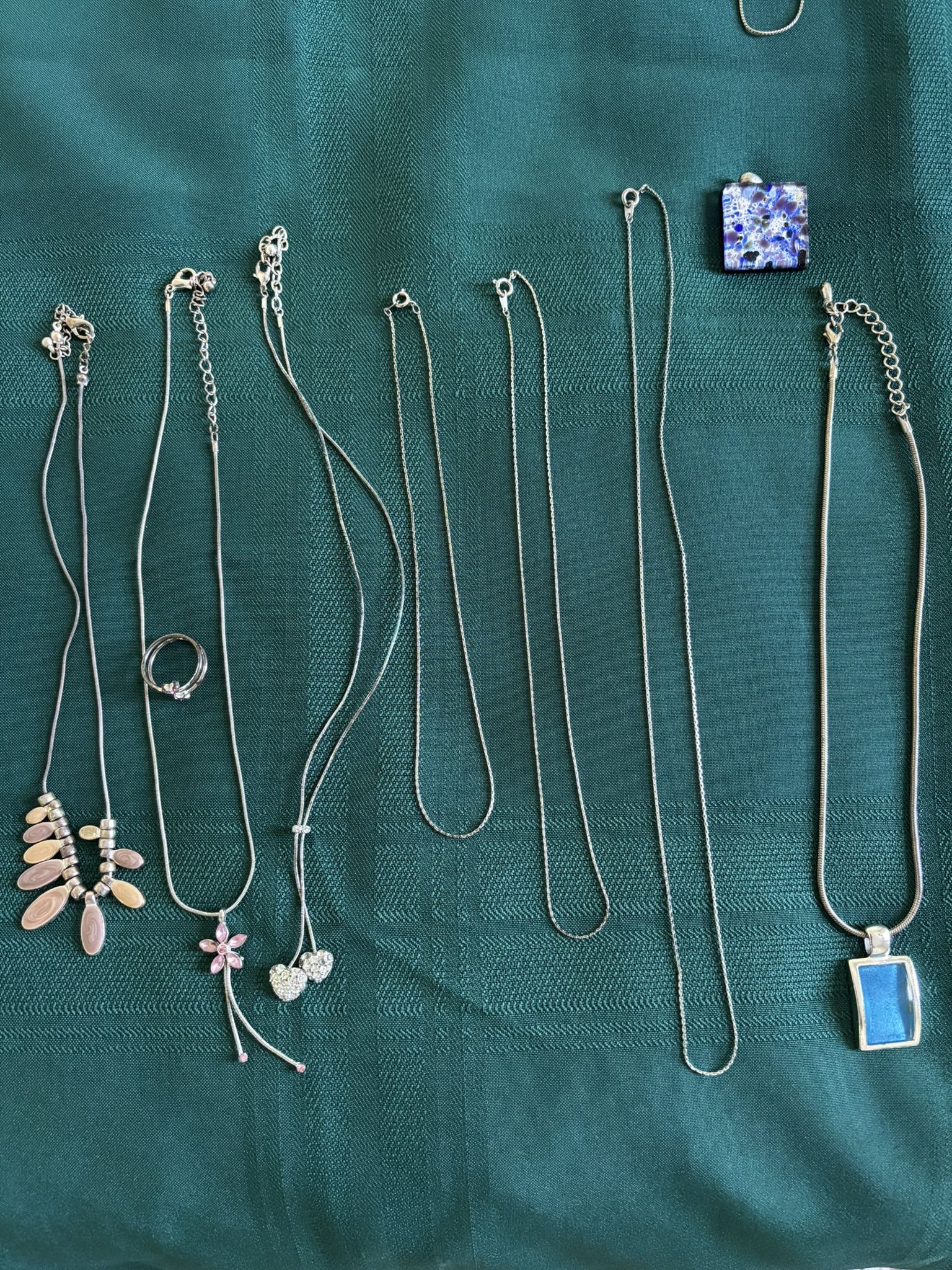 Costume Jewelry Silver Necklaces, lot of 9 pieces, 7 necklaces, 1 matching ring, 1 additional pendant, excellent condition.