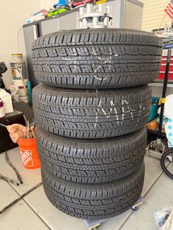 Tires 275/65 R18 and Rims. New (set of 4 )
