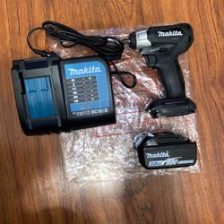 Makita Brushless 2 - Speed 3/8’ Impact Wrench  (XWT12ZB) (1) 3.0 Ah Battery (1) Charger