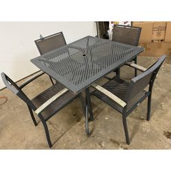 Outdoor patio deck table and 4 chairs. Outdoor dining table with umbrella hole