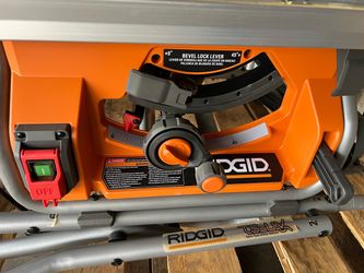 OPEN BOX RIDGID 15 Amp 10 in. Portable Corded Pro Jobsite Table Saw with Stand Table Saw with Rolling Stand