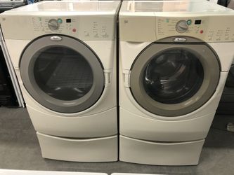 Whirlpool Front Load Washer Dryer Set on Pedestals