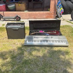 Keyboard, Electric Guitar, And Amp