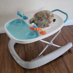 Like New Baby Walker ( Foldable). Price Firm!