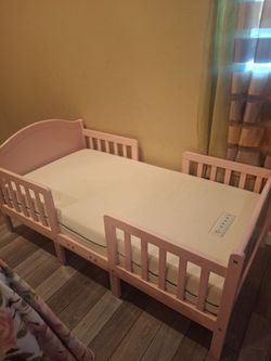 Pink kids/ Toddlers bed.