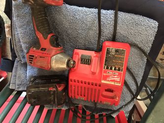 Milwaukee impact drill battery and charger
