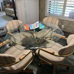 Glass kitchen table and four chairs