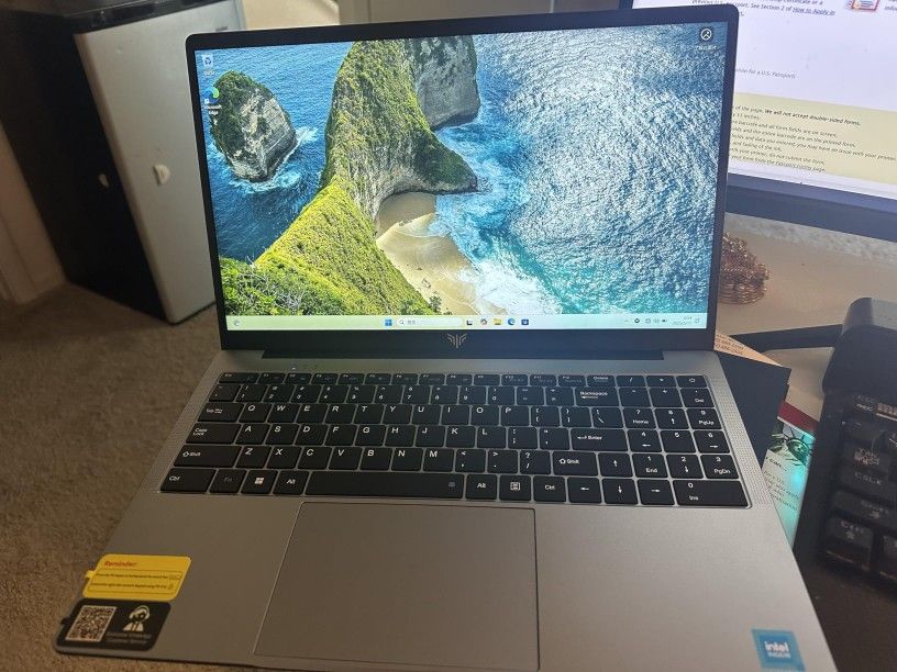 A laptop with a quad - core processor (up to 3.6GHz).