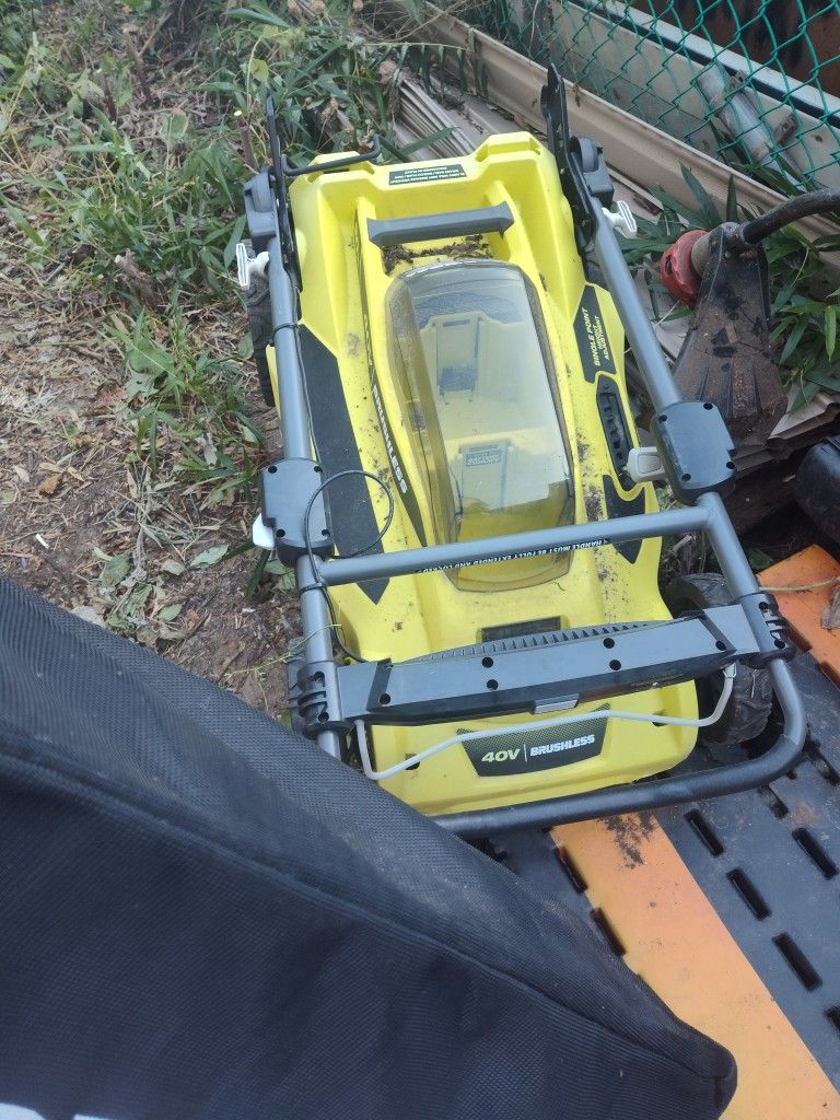 Mower, motors and weed wakers lot bestoffer or trade.