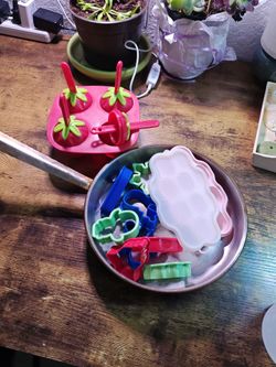 Pan, strawberry and cutters