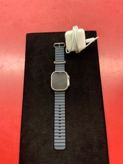 Apple Watch Ultra 1 with charger