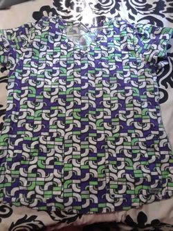 Scrubs. Size large. Worn a handful of times.