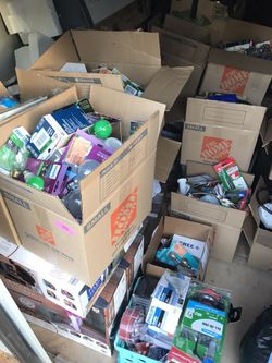 Boxes full of new plumbing and electrical stuff