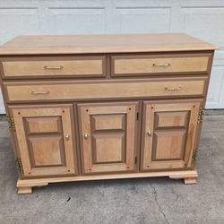 (Yes it's still available).  Solid wood dresser/cabinet.