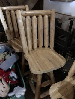 Amish made cedar log swivel bar and table height stools