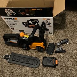 Worx WG322 20V Max Power Share 10” Cordless Chainsaw W/Battery & Charger Included(See & Click On Pictures). New. Never Been Used