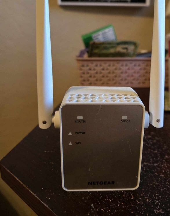 Net gear Wifi Ext And Arris Router