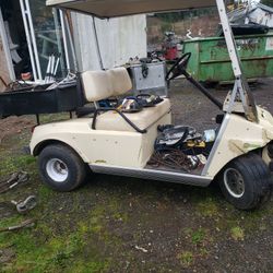 Golf cart with little bed
