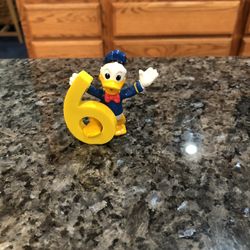 Vintage Disney Donald Duck With The Number 6 Rubber Figure. Size 2 inches Tall . Walt Disney Company . Preowned Excellent Condition