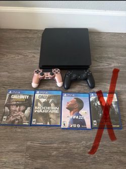 PlayStation 4 with 2 controllers and 3 games