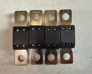 Four 400 Amp/80V Mega Fuses