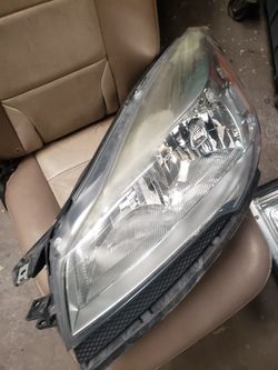 2015 Ford escape driver side head light, OEM headlight in perfect condition