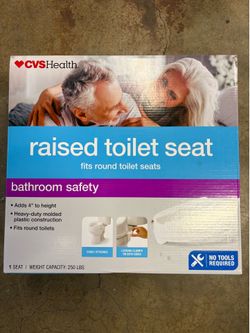 Raised toilet seat - new in box