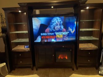Entertainment center with fireplace
