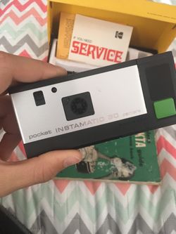 Kodak pocket instamatic with reference book