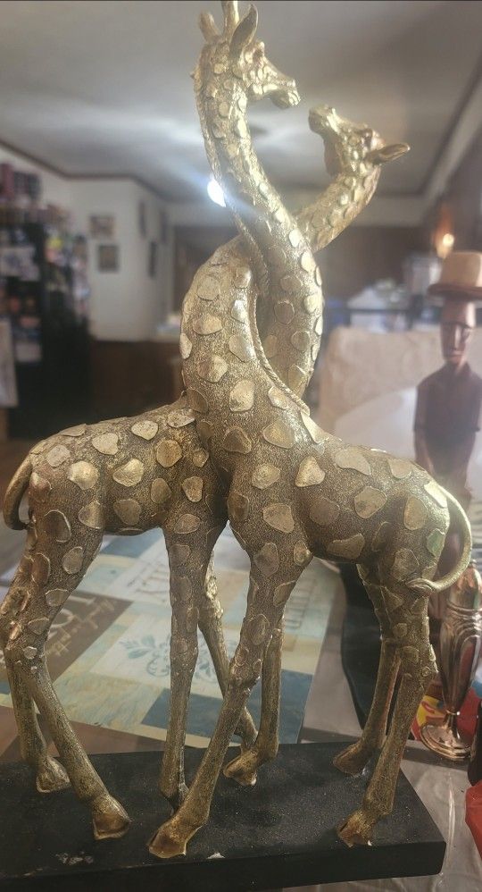 African Giraffe 🦒 Statue. Tell your beautiful love story with these beautiful 🦒 🦒 giraffes. Sturdy wood base.