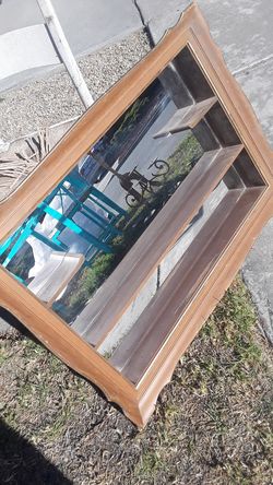 Vintage mirror with shelving