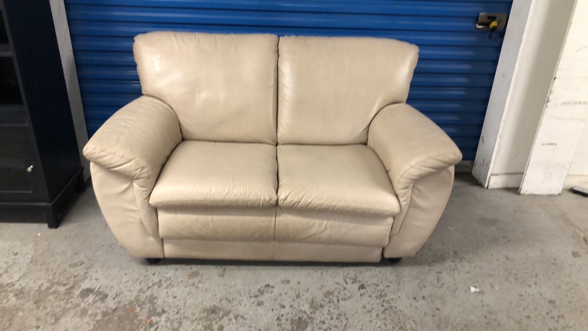 Real Leather good condition loveseat