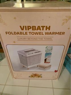 VIPBATH Foldable Towel Warmer. Brand new still in packaging.