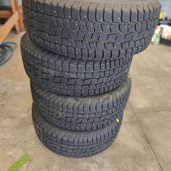 Cooper discovery studded tires with wheels