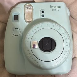Instax mini 9 polaroid film camera. 