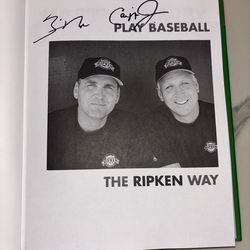 Cal Ripken, Jr. and Billy Ripken signed HC book, ‘Play  Baseball The Ripken Way’.