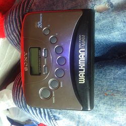 Sony Walkman cassette tape bundle with 1 cassette tape and old style ear buds