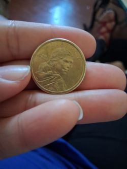 Golden 1$ Coin