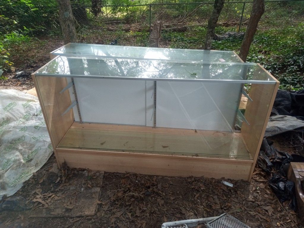I I Have Two Display Cases Both Are In Great Shape All The Glasses With Them Shelves Doors Like I Said I Have Two Of My Identical I Said $125 For Both