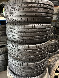 Set of 4 matching tires like new Pirelli all season 235/60R16