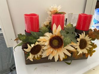 Sun flowers and candle holders
