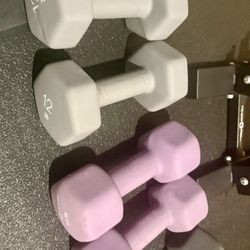 Cast Iron Neoprene Coat ...Set of Dumbbells with Rack; pairs of  12s, o15s and 17.5 lbs. 